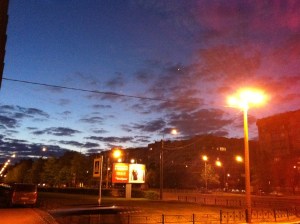 11:45pm, in front of our hotel. It never got completely dark and you can see some lighter spots in the sky. Crazy.