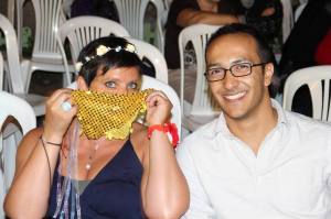 With the bride's brother. Not sure why I'm covering my face...likely should have been covering my cleavage.